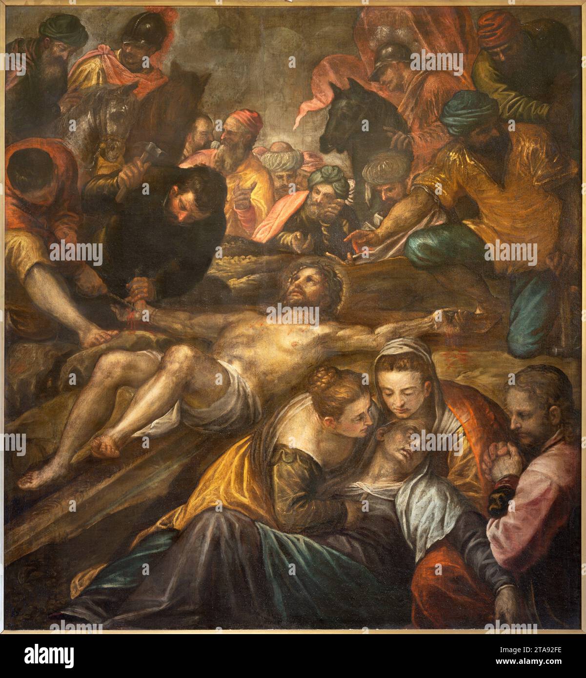 VICENZA, ITALIEN – 5. NOVEMBER 2023: Das Gemälde Jesus wird das Kreuz in der Katharina von Alessandro Maganza (1587–1589) genagelt. Stockfoto