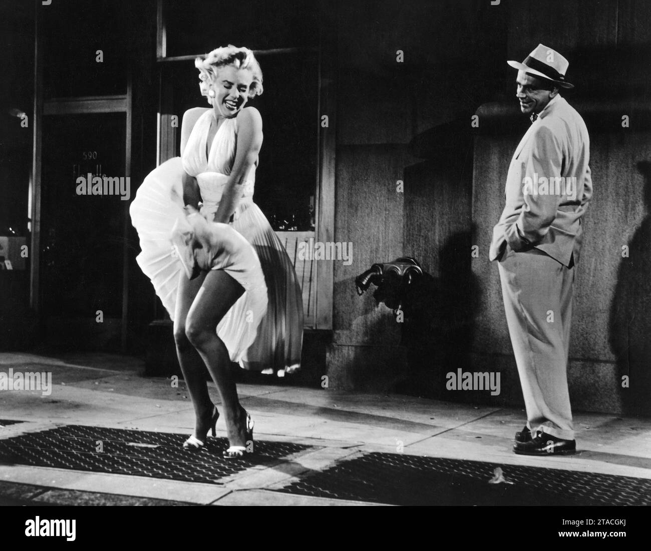 Die Sieben-Jahr-Juckreiz Marilyn Monroe Und Tom Ewell Stockfoto