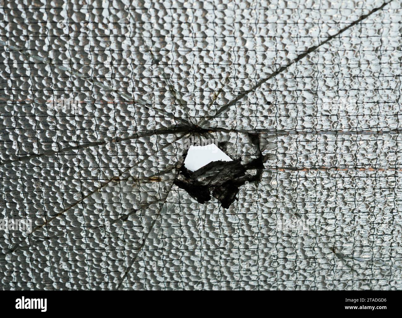 Ein beschädigtes mattes Fenster Stockfoto