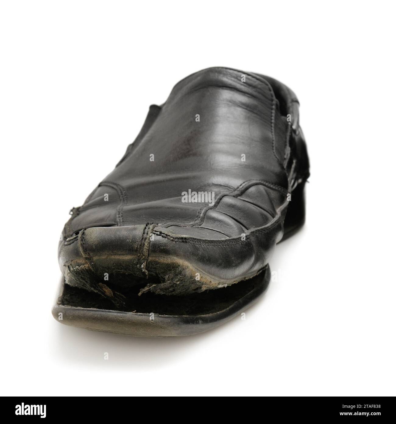 Alter Schuh auf weißem Hintergrund Stockfoto