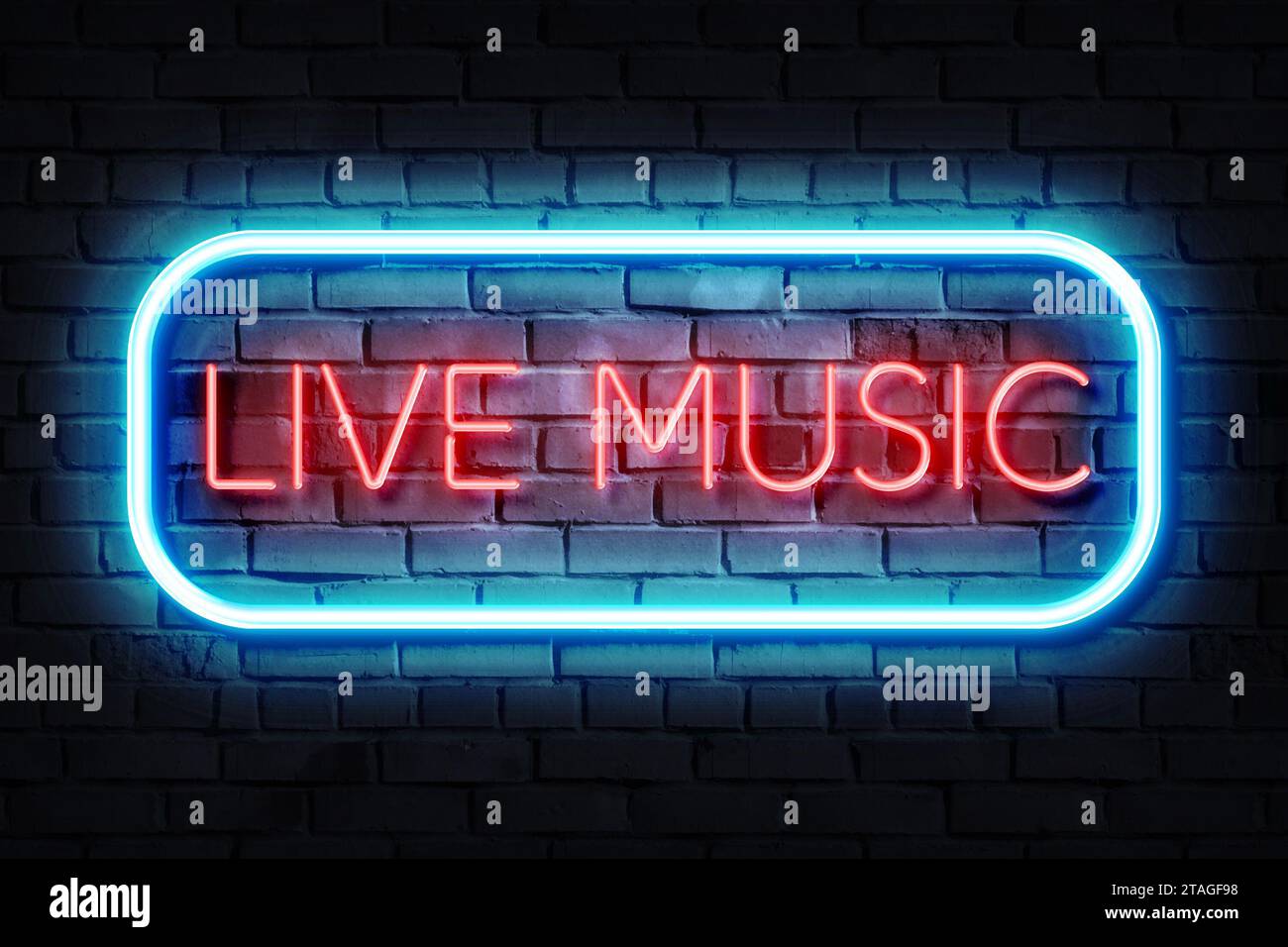 Live Music Neonschild an einer dunklen Wand Stockfoto