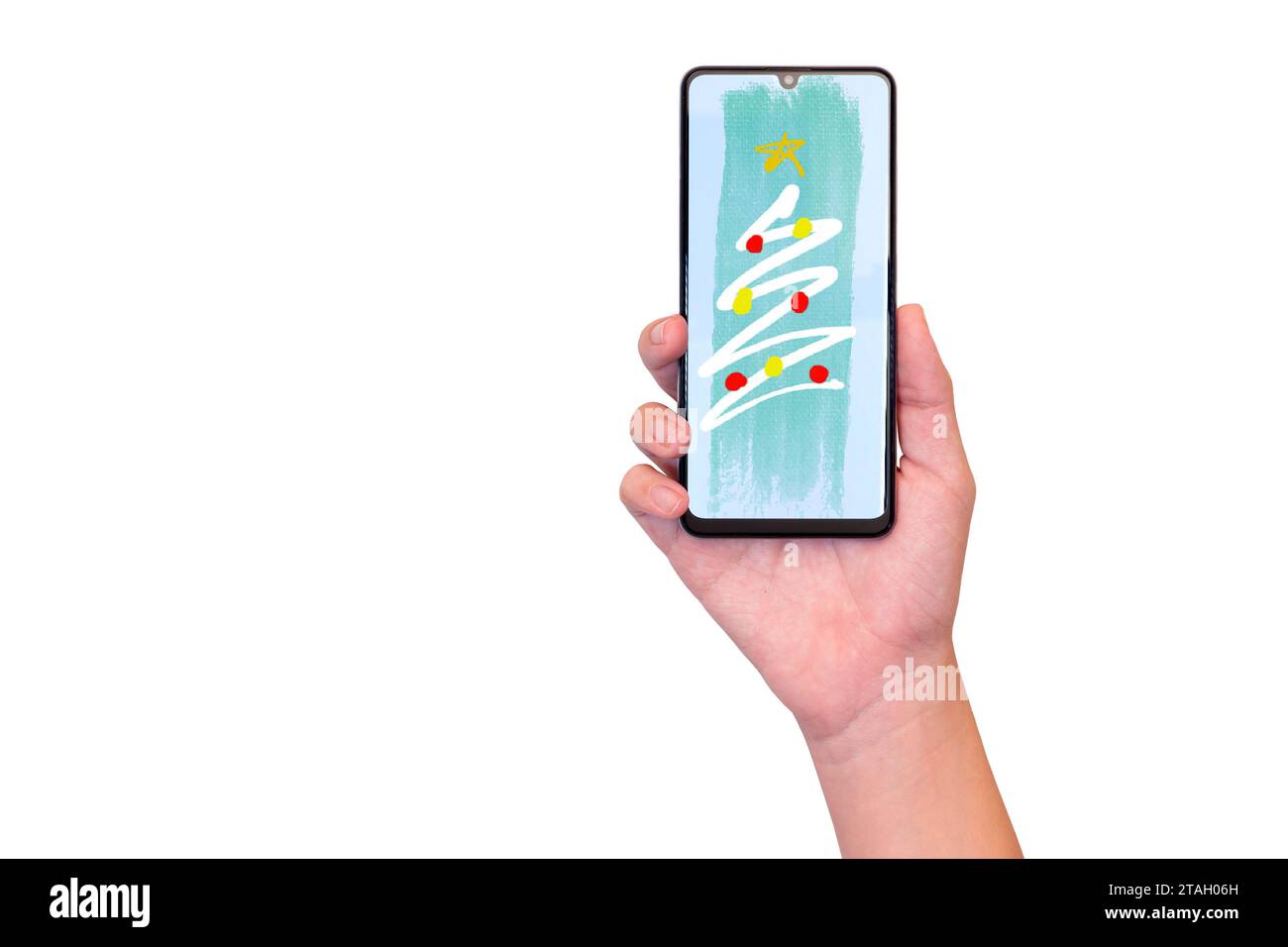 Die Hand eines Mannes, der ein Smartphone mit abstrakter gestreifter Tapete in Form eines Weihnachtsbaums hält. Digitale Grußkarten zur Weihnachtsfeier. Stockfoto