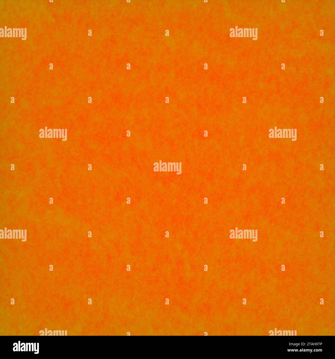 Bunte Papierstruktur. Orangefarbener abstrakter Hintergrund. Platz für die Platzierung von Text oder Notiz für Marketingzwecke. Stockfoto