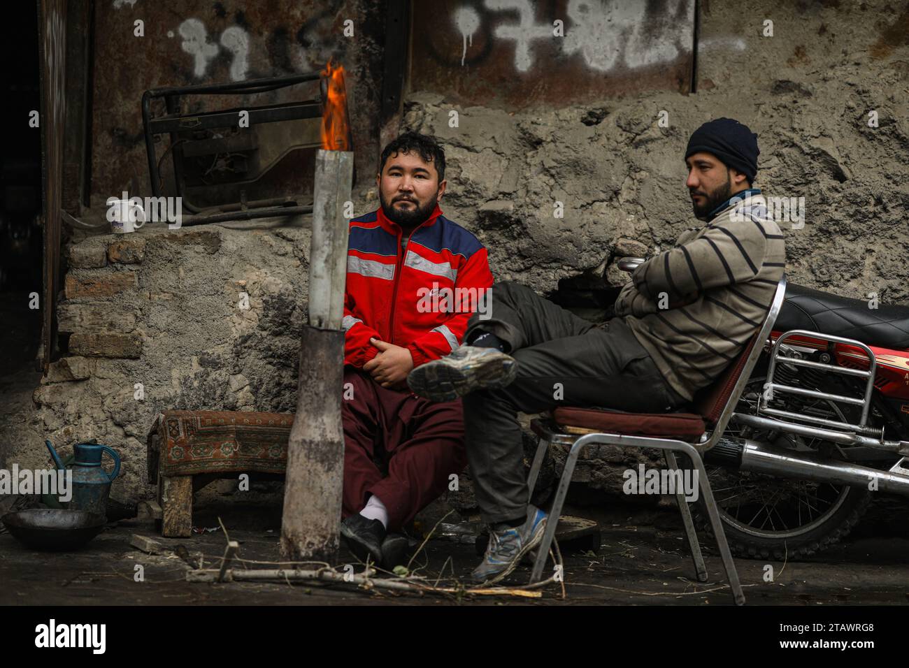 People in need, refugees, and Afghan individuals requiring assistance. Stockfoto