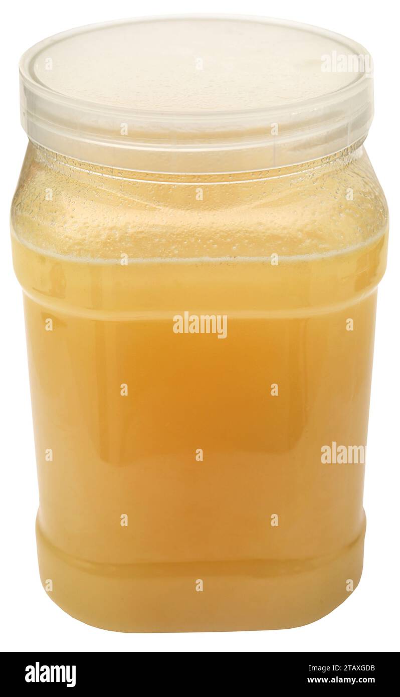 Frisch geernteter Honig in einem Glas Stockfoto