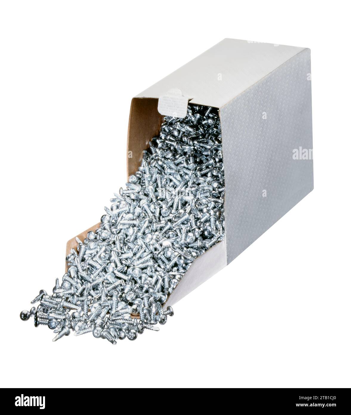 Viele Metallschrauben in einem umkippten Karton Stockfoto