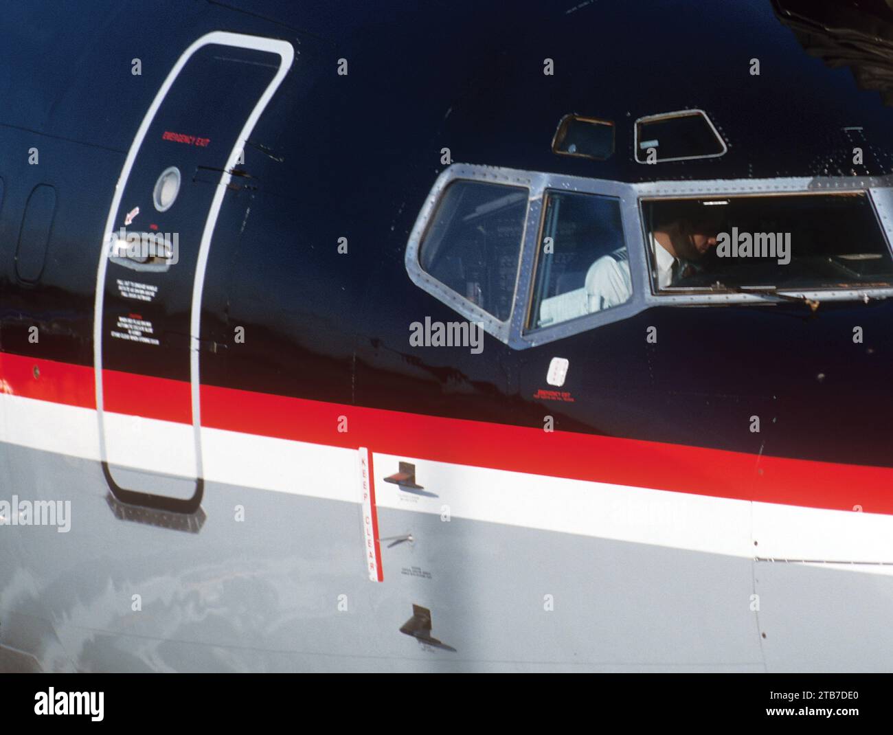 US Airways Pilot im Cockpit von Jet Stockfoto