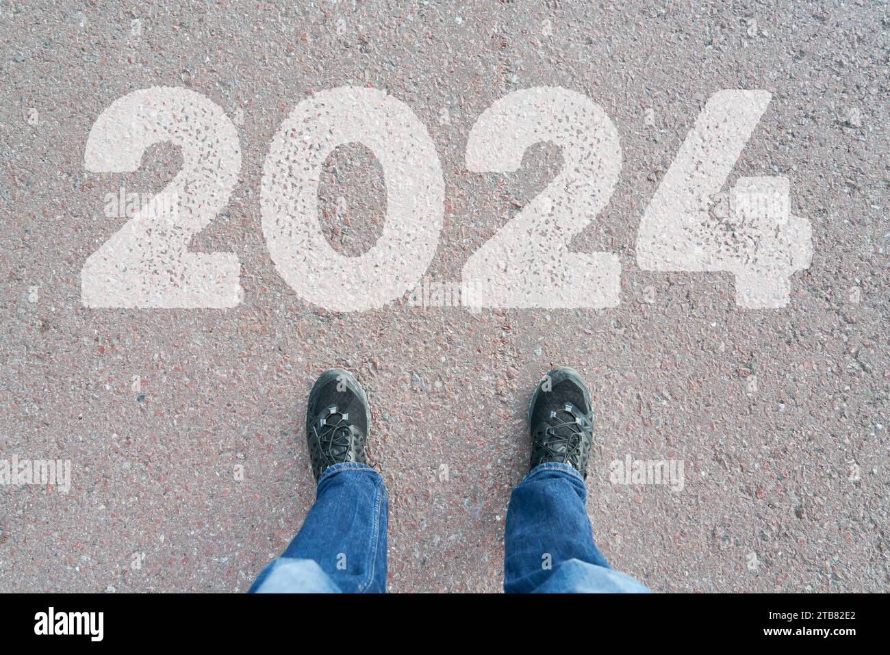 Das Jahr 2024 wurde als Neujahrsvorsatz-Änderungskonzept auf die Straße geschrieben Stockfoto
