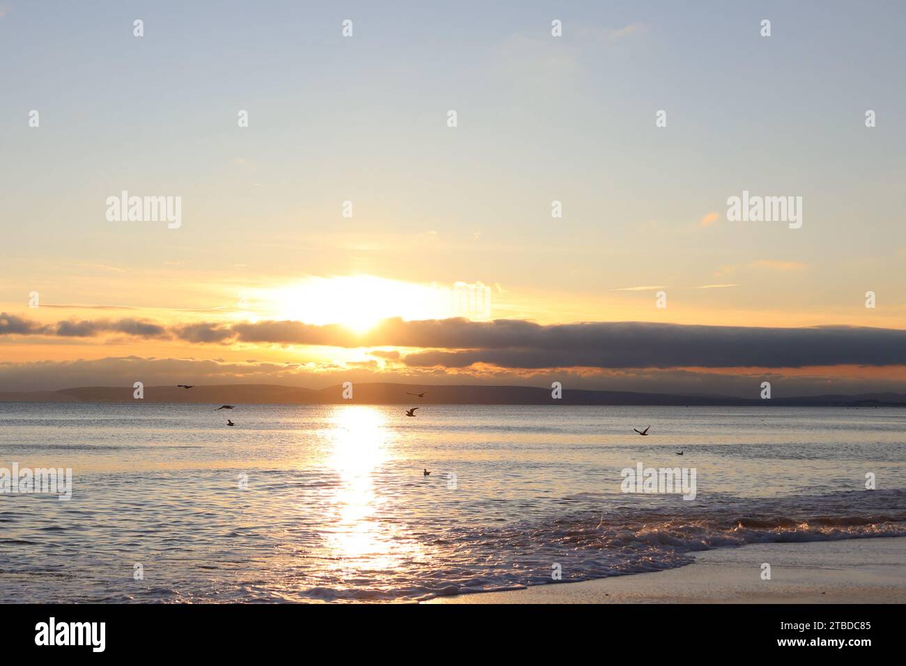 Dezember Sonnenuntergang am Southbourne Beach in Bournemouth Dorset Stockfoto