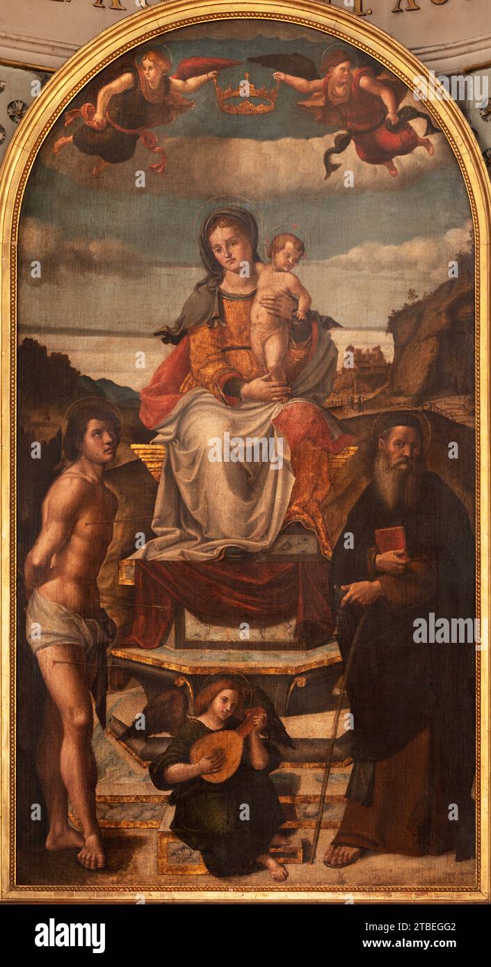 VICENZA, ITALIEN - 7. NOVEMBER 2023: Das Gemälde der Madonna mit der Heiligen Sebastian und St. Anthony der Abt in der Kirche Chiesa di San Giacomo Maggiore Stockfoto