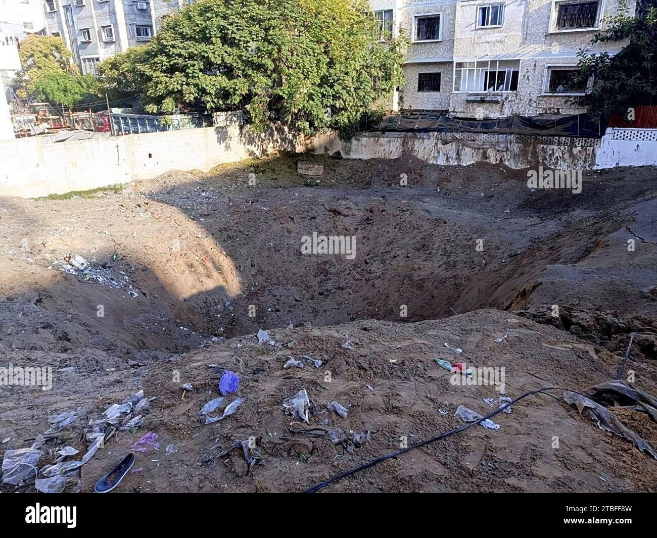 A bombing hole by Israeli military is seen in Khan Younis in the Gaza ...