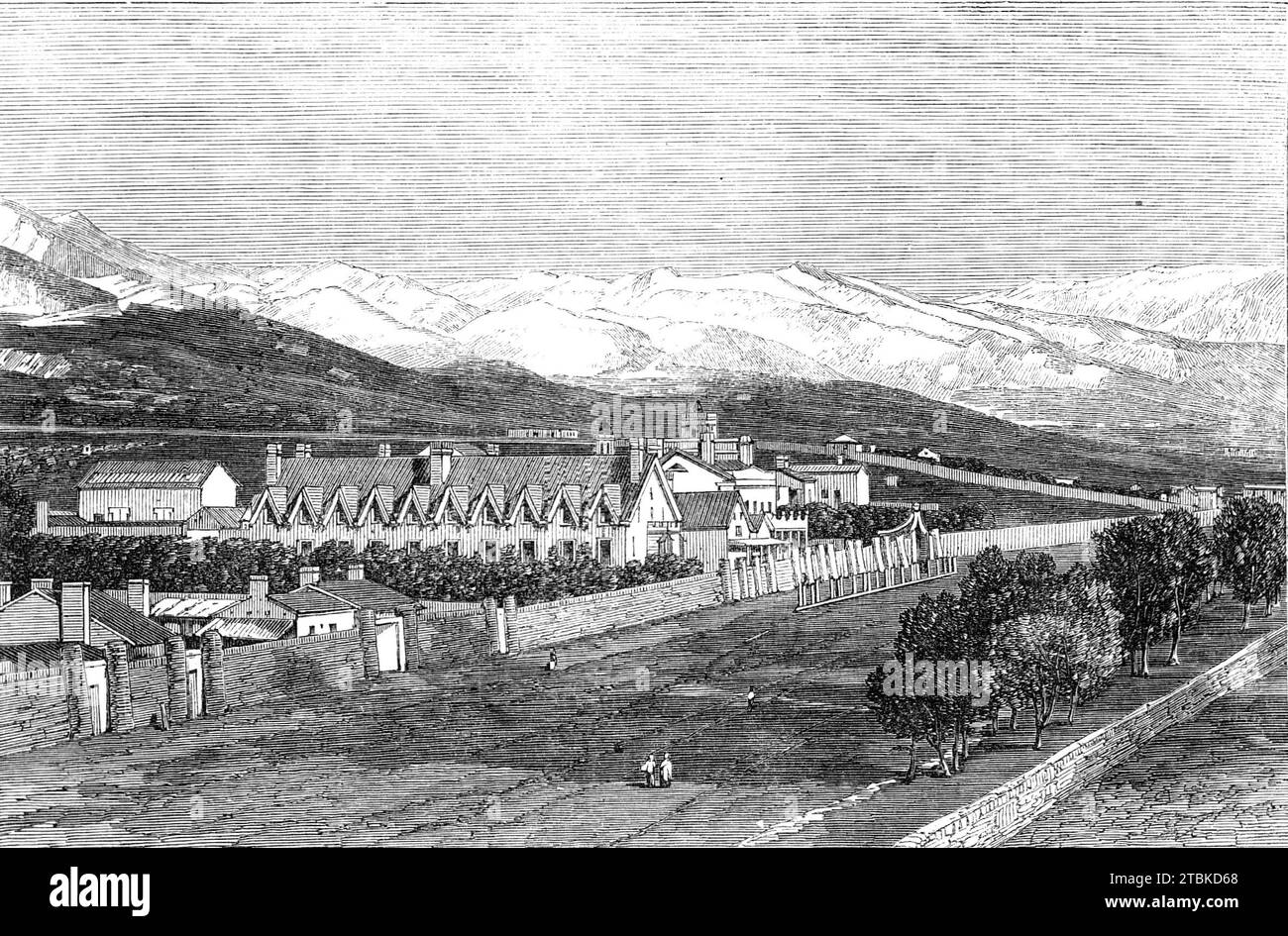 Die Residenz von Brigham Young in Great Salt Lake City, Utah, 1861. Das Haus des Mormonen-Anführers Young befindet sich auf der Nordseite der Stadt, an einem Abgrund, über dem sich die Ausläufer der Wahsatch Mountains erheben. In The View befindet sich sein Haus fast in der Mitte, überragt von einem kleinen quadratischen Turm mit einem goldenen Bienenstock auf der Spitze, dem Wahrzeichen der Stadt. In diesem Gebäude aus Holz wohnen seine erste Frau und Familie. Das niedrige Gebäude auf der linken Seite enthält die Büros der Kirche. Das nächste auf der linken Seite, das Hauptobjekt auf dem Bild, ist das Zion-Haus, in dem die restlichen Ehefrauen wohnen Stockfoto