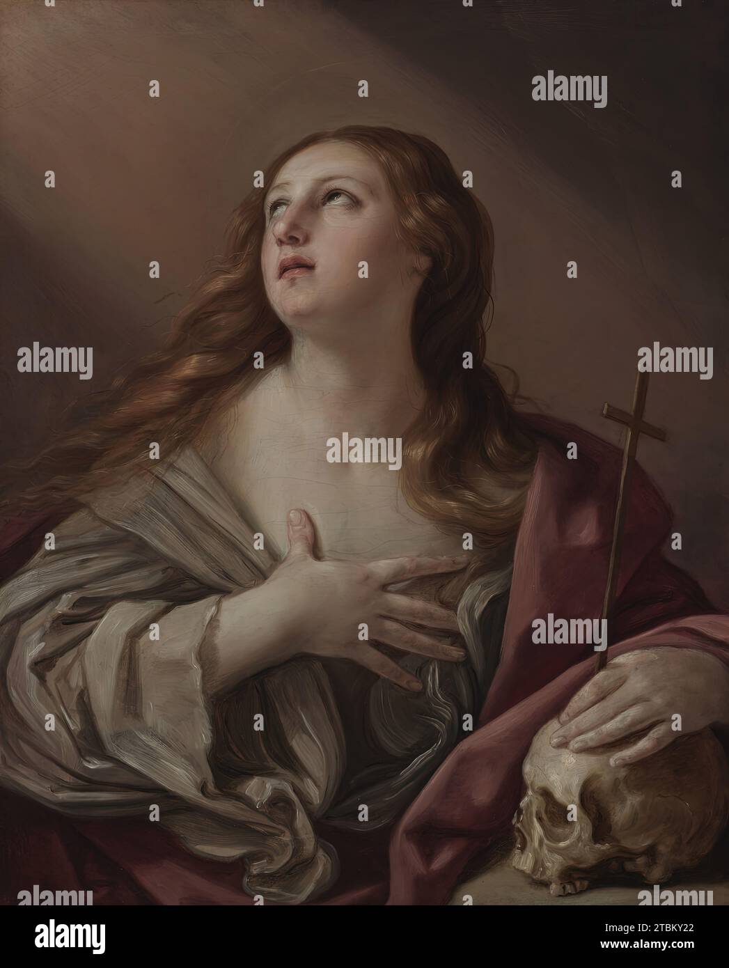 Die Buße Magdalene, 1635. Nach christlicher Überlieferung bereute Maria Magdalena nach ihrer Begegnung mit Christus ihre früheren sündigen Wege. Mit ihrer elfenbeinfarbenen Haut und ihren langen goldenen Haaren richtet die schöne Magdalene ihren Blick zum Himmel. Ihr Kreuz und der Schädel machen deutlich, dass sie über die Kürze des Lebens und die Erlösung nachdenkt, die durch den Tod Christi möglich wurde. Stockfoto