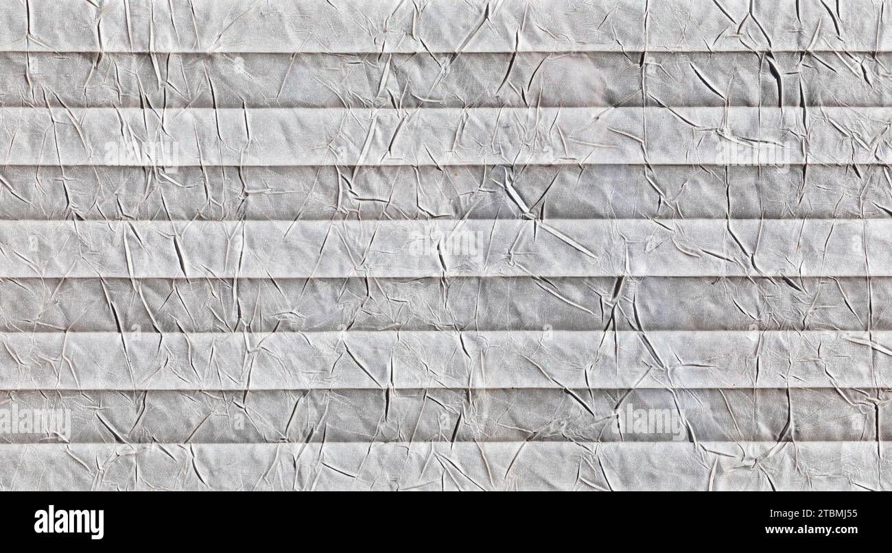 Zerknitterte weiße Papieroberfläche, abstrakter Hintergrund, Grafische Elemente, Texturhintergrund, Österreich Stockfoto