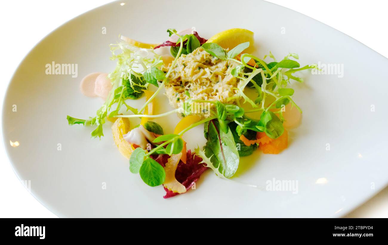 Ein tian frischer Krabbe und geräuchertem Schellfisch mit einem feinen Salatdressing - John Gollop Stockfoto