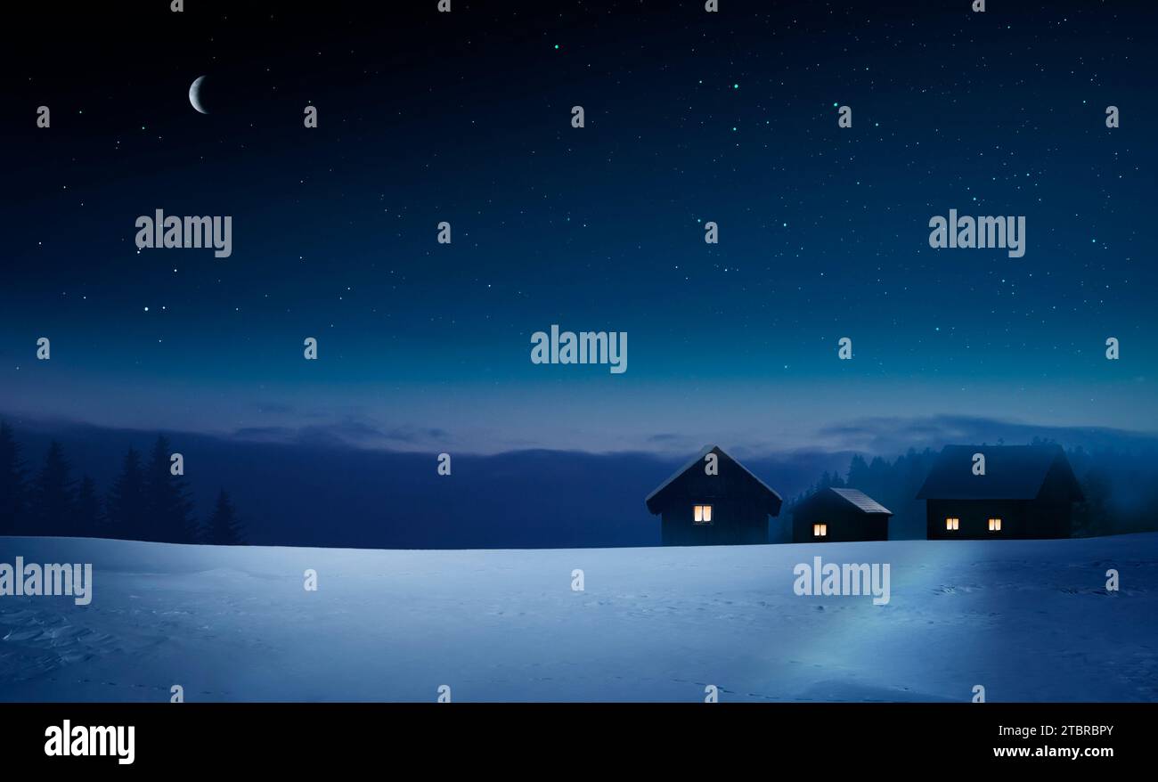 Beleuchtetes Dorf in einer kalten Winternacht Stockfoto