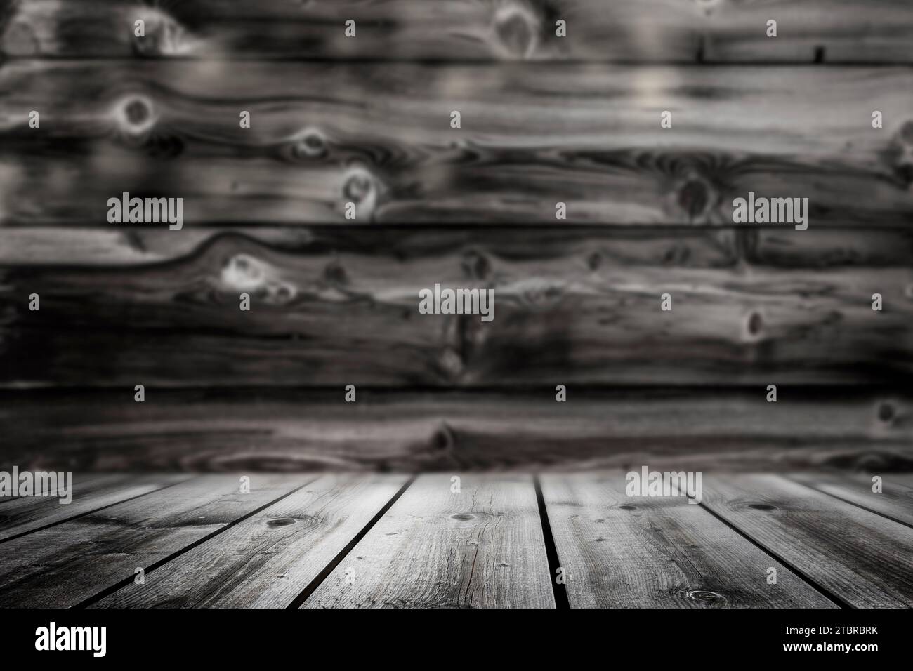 Verschwommener hölzerner Hintergrund mit einem Holztisch Stockfoto
