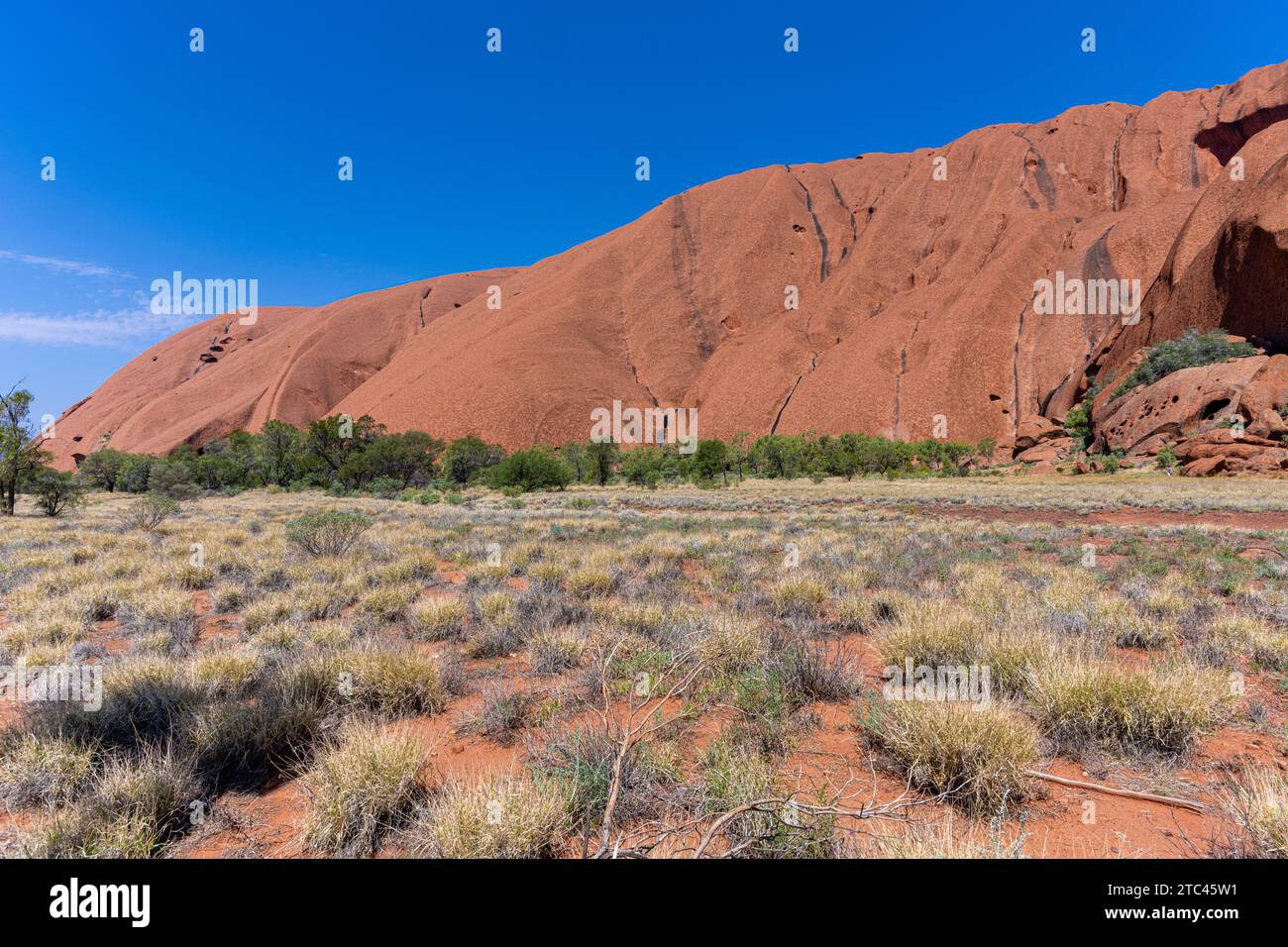 Uluru ist heilig für die Pitjantjatjara, die Aborigines der Gegend, bekannt als die Aṉangu. Das Gebiet um die Formation ist die Heimat einer Fülle von Stockfoto