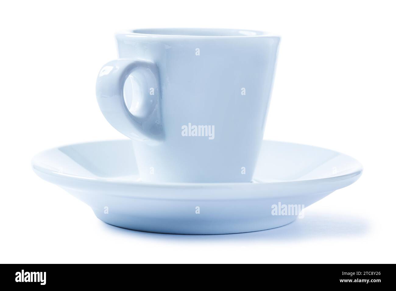 Kleine weiße isolierte Kaffeetasse Stockfoto