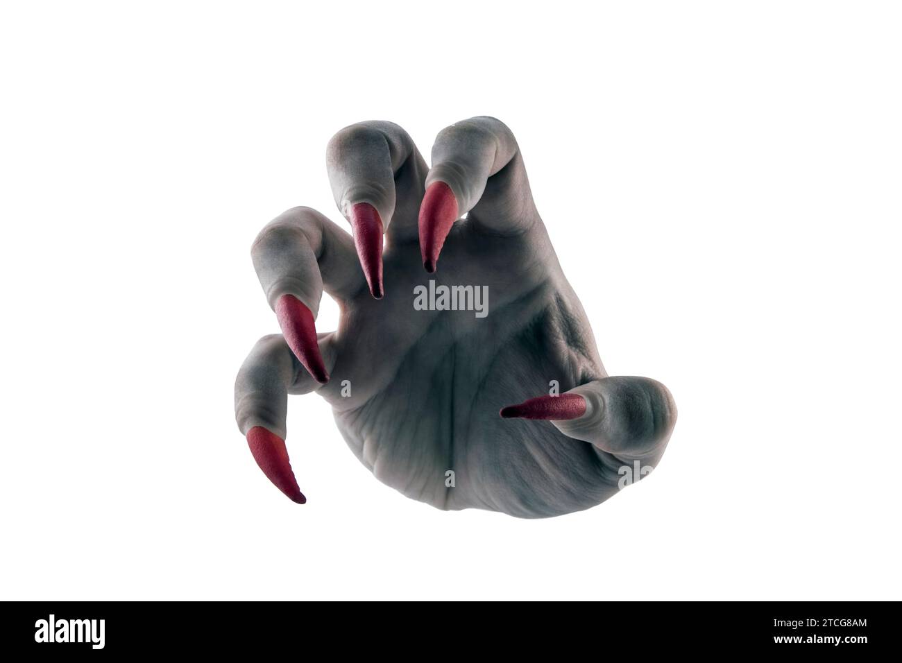 Gruselige Monsterhand mit roten Klauen isoliert auf weißem Hintergrund mit Schneidepfad Stockfoto