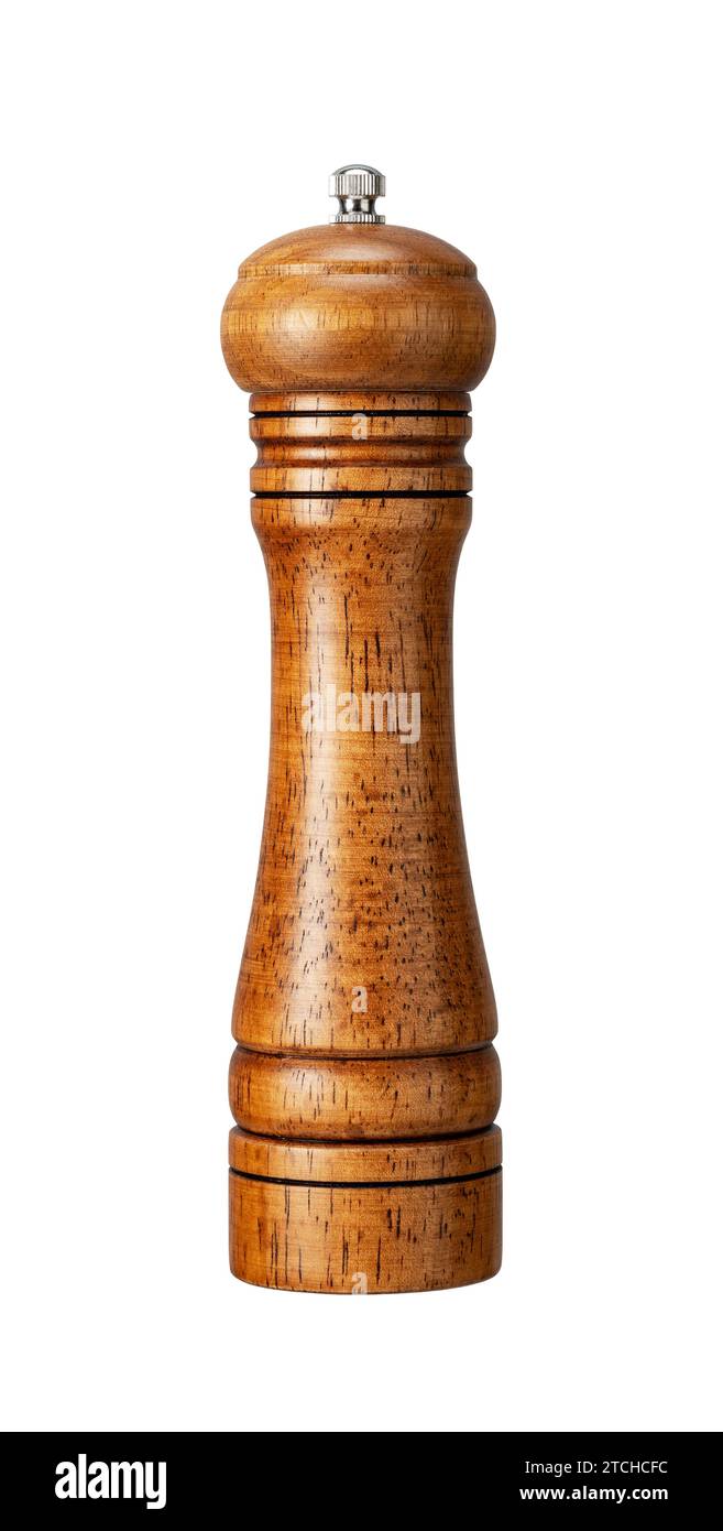 Hölzerne Pfeffermühle auf weißem Hintergrund. Stockfoto