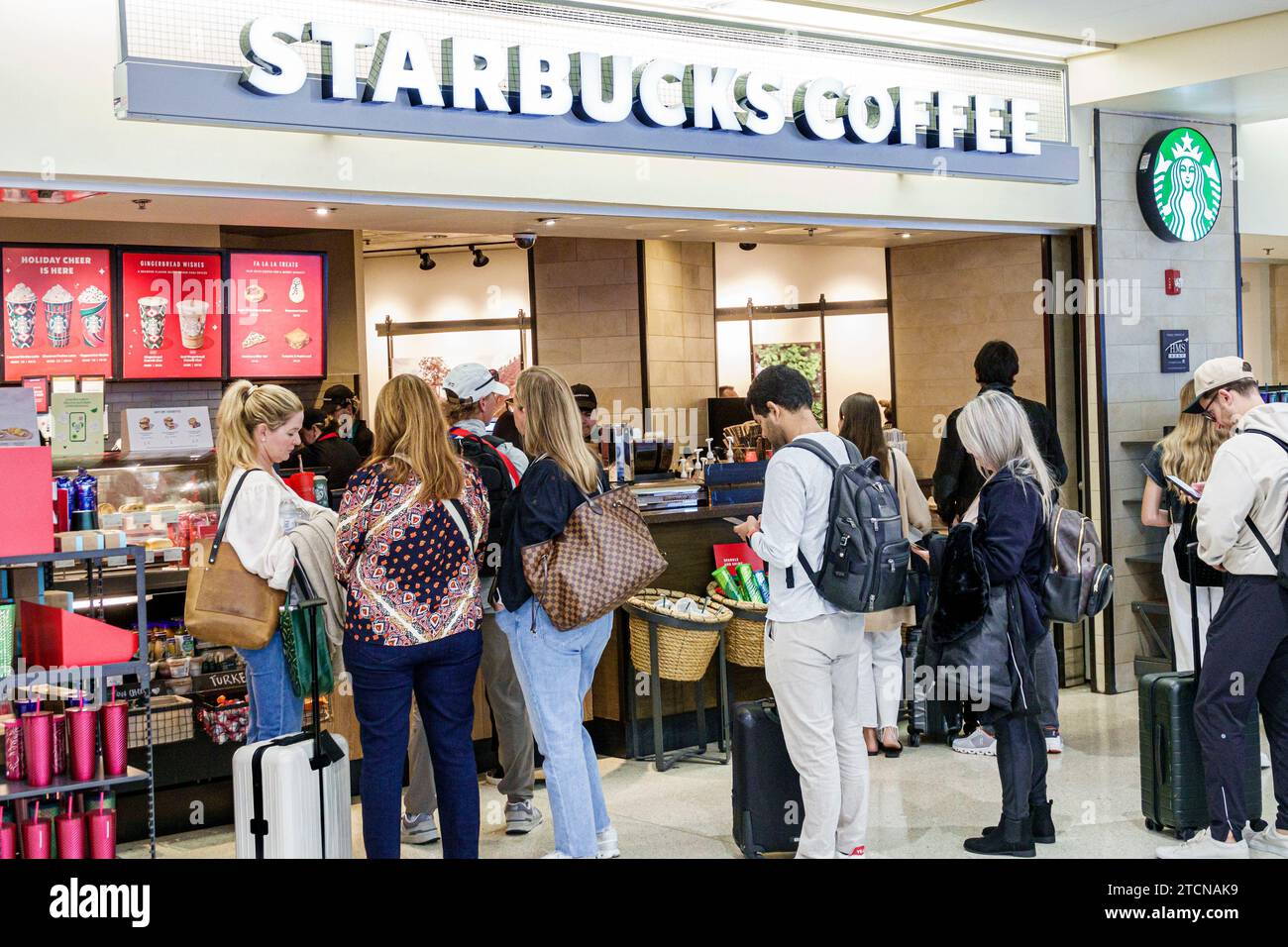 Miami Florida, Miami International Airport MIA, Innenraum, Terminal-Halle, Gate-Bereich, Reisende Reisende Passagiere, Starbucks Coffee, mA Stockfoto