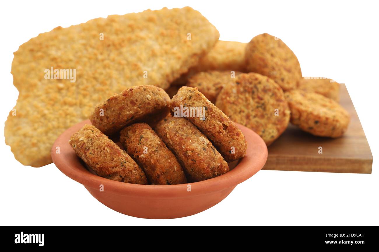 Knuspriges Fischfilet mit Gemüsefalafel eine köstliche Küche Stockfoto