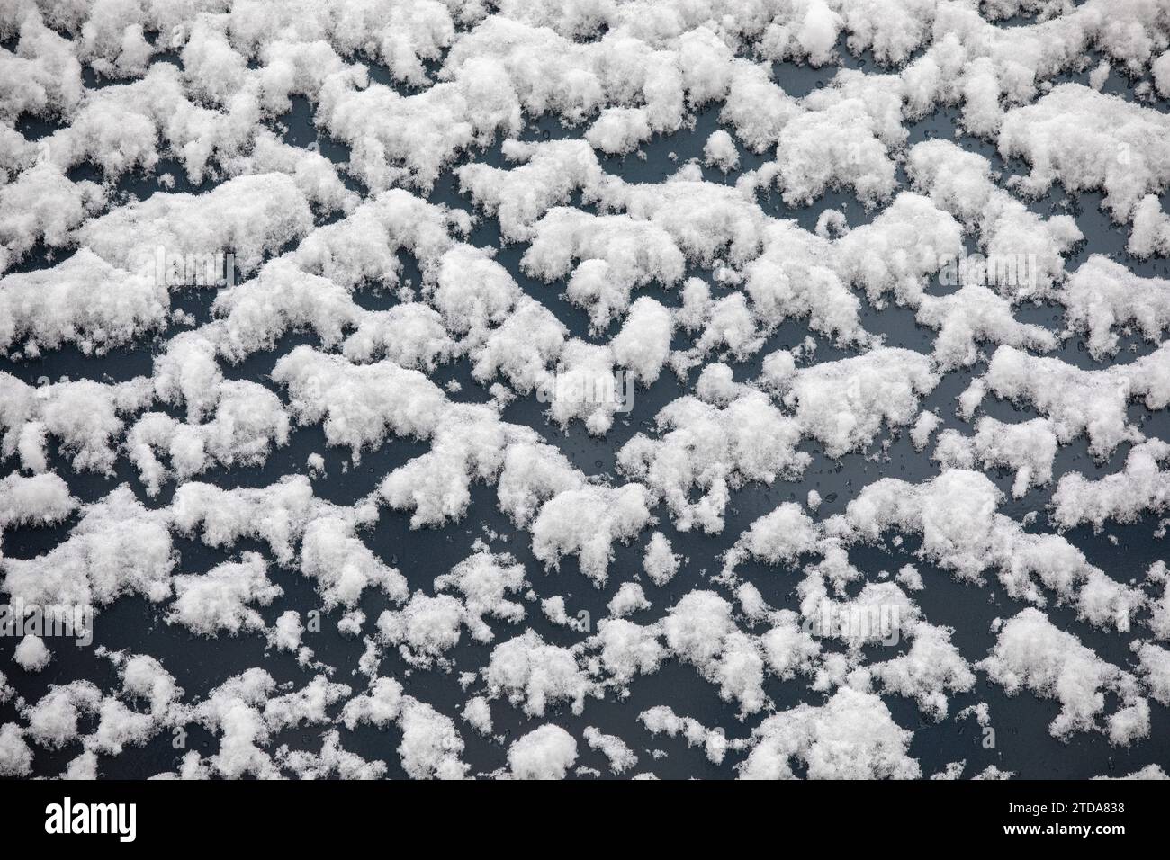 Hintergrund: Graue Transportfahrzeug-Wandstruktur für winterliche Szenen Stockfoto