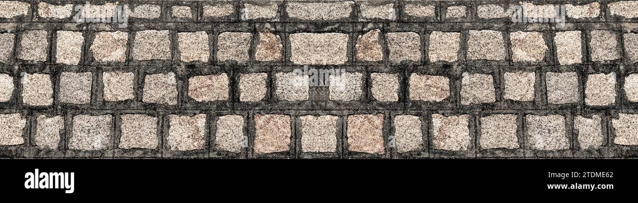 Mauerwerk aus Steinen oder Blöcken. Rustikale alte Steinmauer mit verschiedenen Größen von Felsen Stockfoto