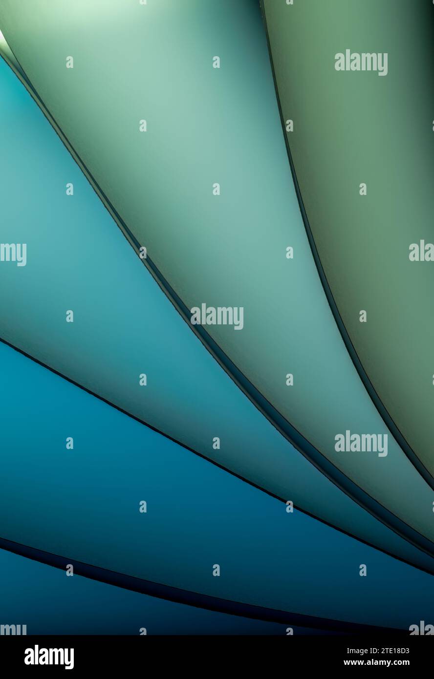 Blätter gefaltetes Papier, fotografiert mit zwei separaten Blitzen und mit farbigen Gelen, um die Farbe hinzuzufügen Stockfoto