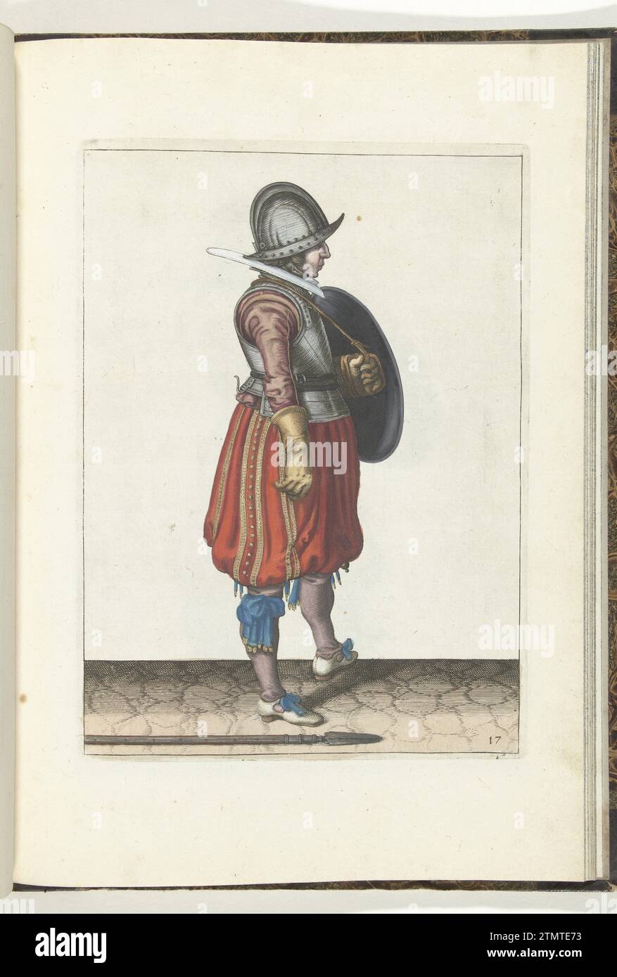 Die Übung mit Schild und Spießen: Der Soldat mit Schild bereit und die Spieße neben seinem rechten Fuß auf dem Boden (Nr. 17), 1618, 1616 - 1618 die Übung mit Schild und Spießen: der Soldat mit dem Schild bereit und der Spieß neben seinem rechten Fuß auf dem Boden, 1618. Teil der Abbildungen in: Adam van Breen, Nassauische Waffenhandelung, 1618, Kennzeichen Nr. 17. War Awareness um 1600. Nordholländisches Papier, das die Übung mit Schild und Spießen graviert: Der Soldat mit Schild bereit und der Spieß neben seinem rechten Fuß auf dem Boden, 1618. Teil der Abbildungen in: Stockfoto