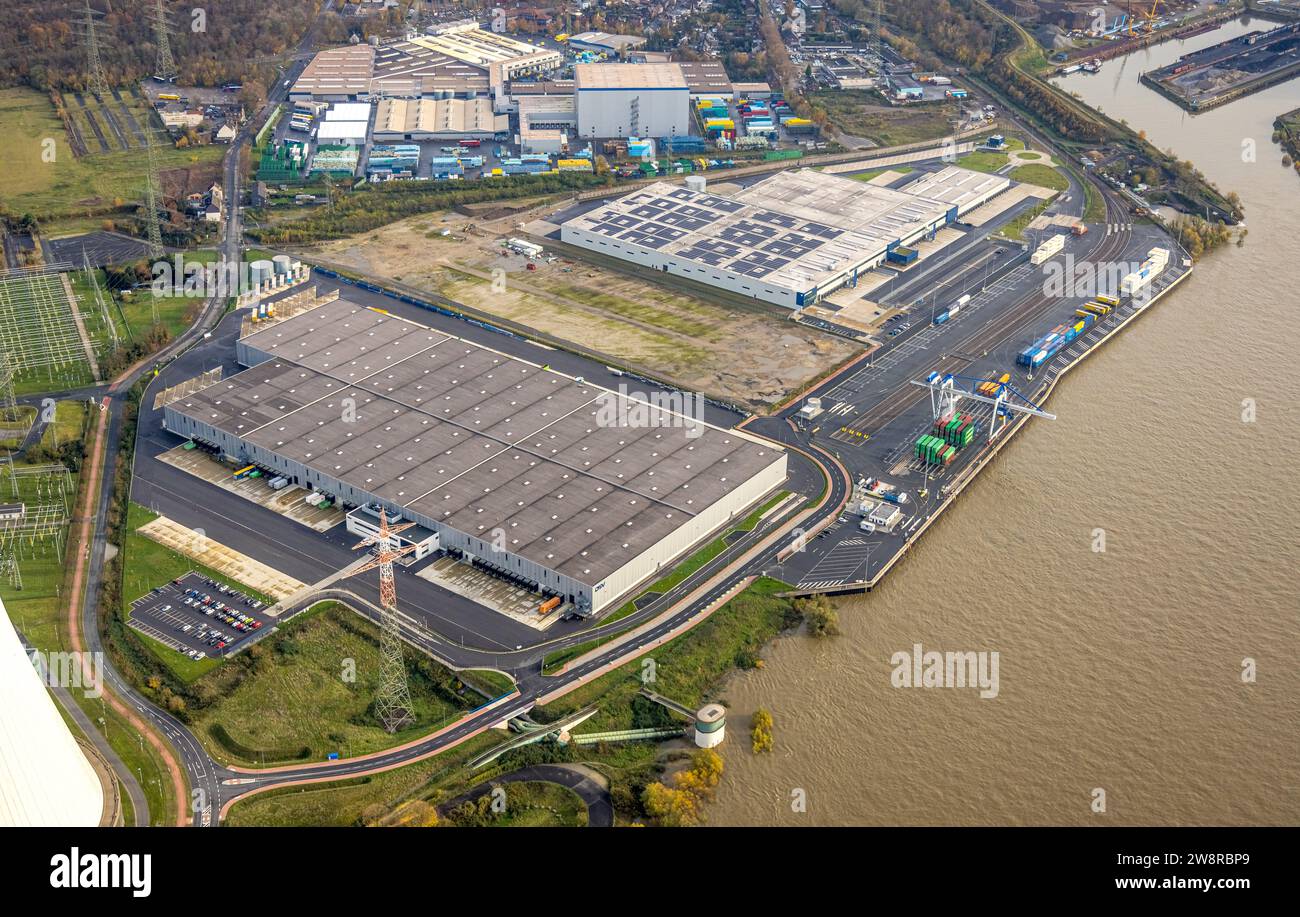 Luftaufnahme, Logport VI (sechs) Industriegebiet Logistikdienstleistungen, umgeben von herbstlichen Laubbäumen, Alt-Walsum, Duisburg, Ruhrgebiet, Nordrhein Stockfoto