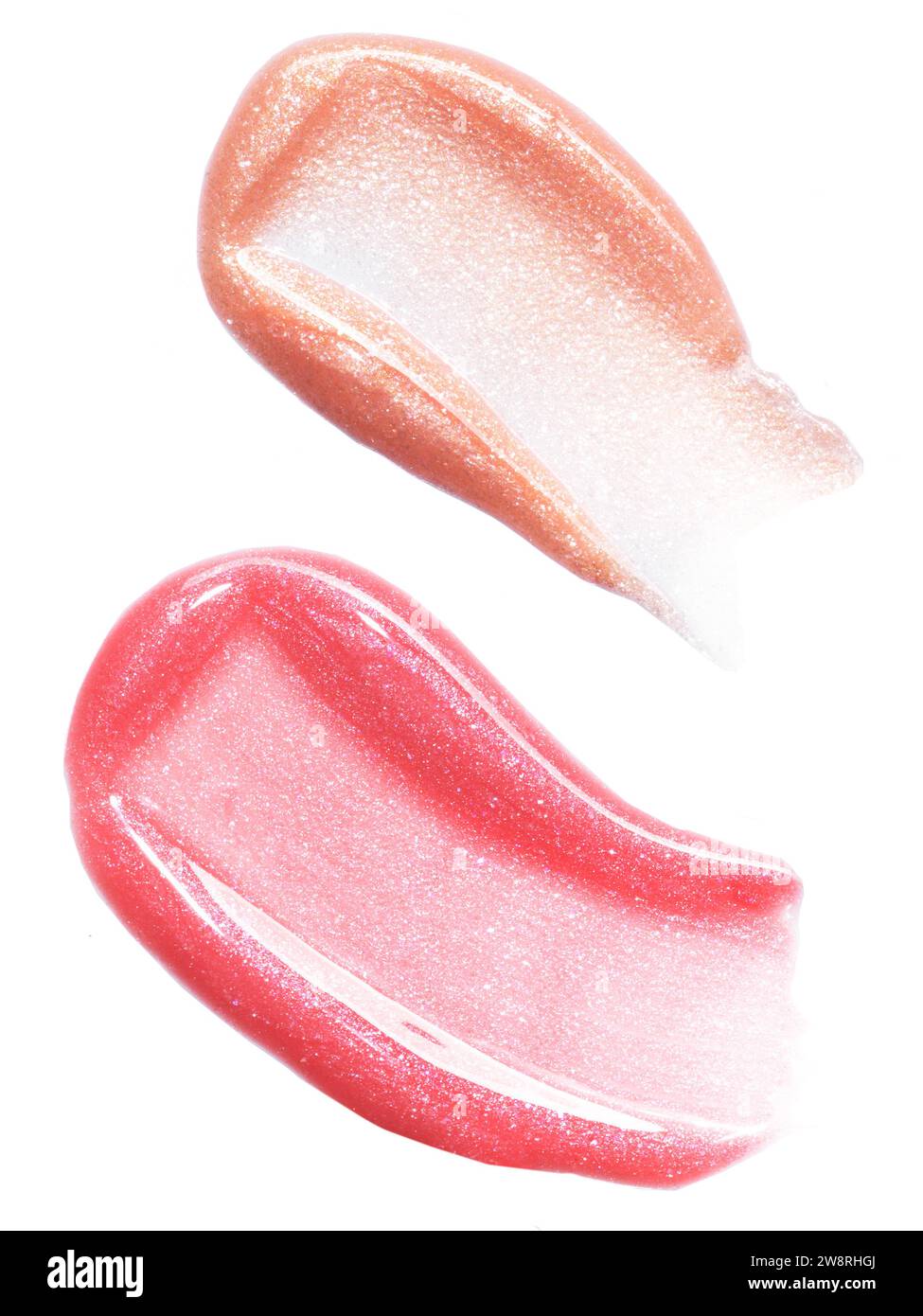 Lippenglanz-Textur-Zusammensetzung aus Pink Gold isoliert auf weißem Hintergrund. Kosmetikabstriche Stockfoto