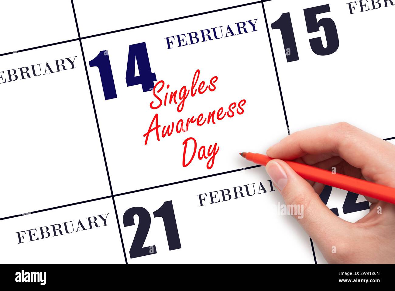 Februar. Text per Hand schreiben Singles Awareness Day am Kalenderdatum. Speichern Sie das Datum. Urlaub. Tag des Jahres-Konzept. Stockfoto