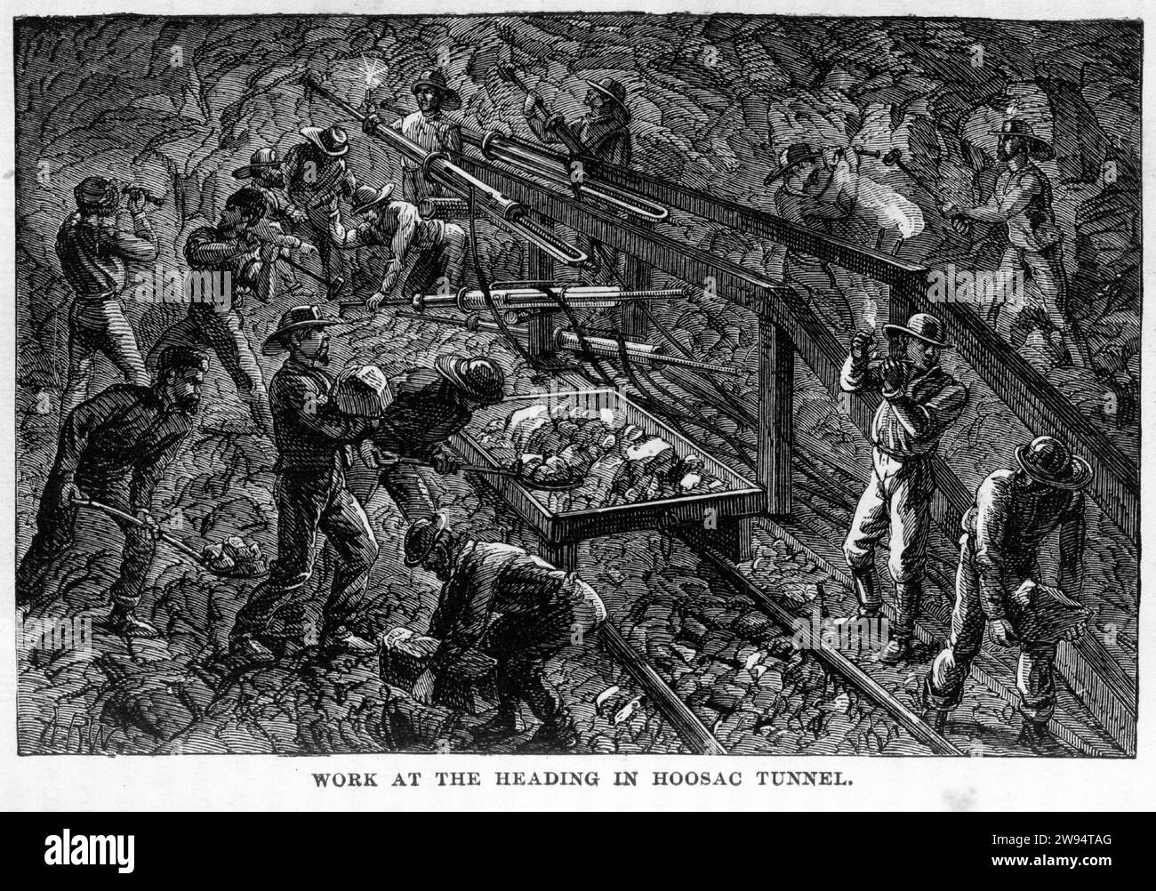 Gravur von Männern, die in Richtung des Hoosac Tunnels (auch Hoosic oder Hoosick Tunnel genannt) arbeiten, einem 4,75 Meilen (7,64 km) langen aktiven Eisenbahntunnel im Westen von Massachusetts, der um 1878 durch die Hoosac Range, eine Verlängerung der Vermont's Green Mountains, von der Underground World aus verläuft Stockfoto