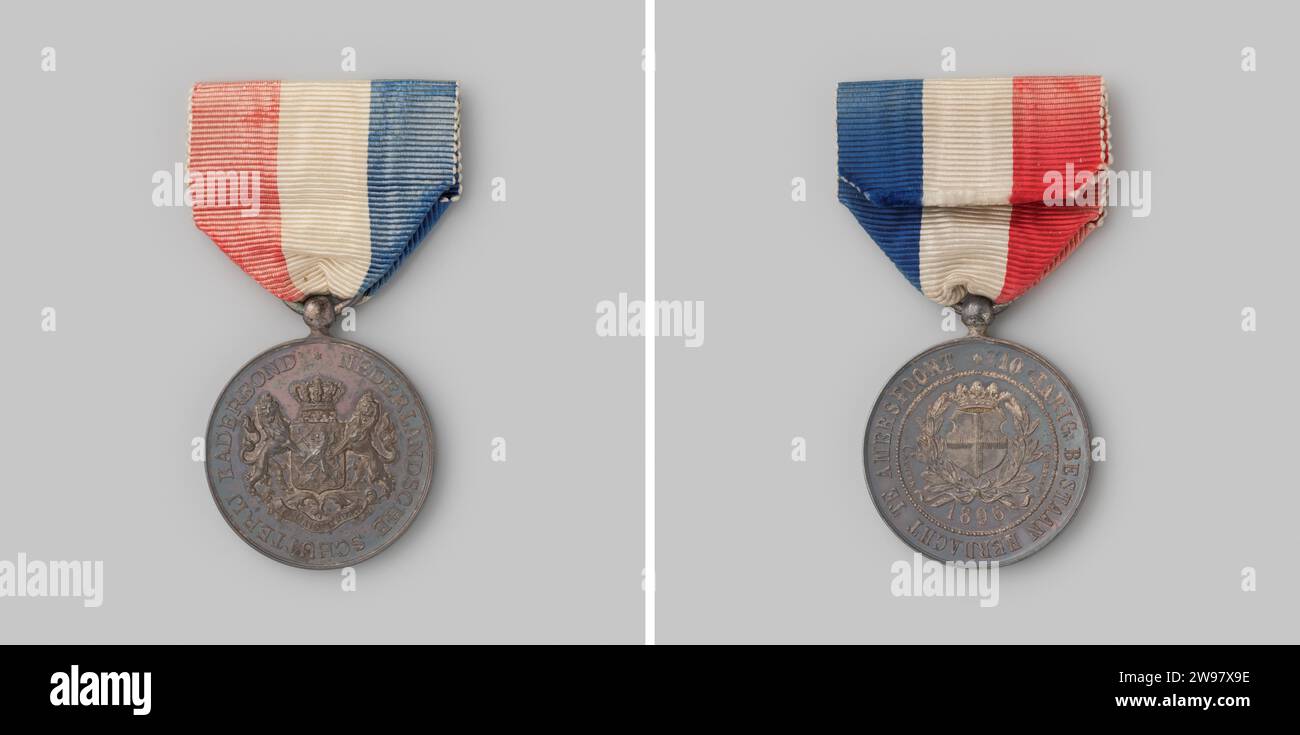 Gedenkmedaille zum zehnten Jahrestag der Nederlandsche schutterij Rahmenunion, Anonym, 1896 Geschichtsmedaille Penning mit Auge, Ring und Band. penning: Metall. Fussel: Textilmaterialien Stockfoto