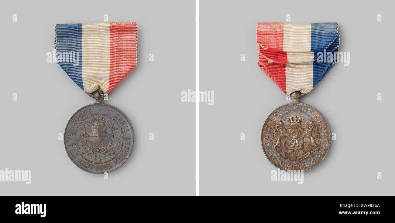 Gedenkmedaille zum zehnten Jahrestag der Nederlandschen schutterij Rahmenunion, Anonym, 1896 Geschichtsmedaille Penning mit Auge, Ring und Bandstift: Metall. Fussel: Textilmaterialien Stockfoto