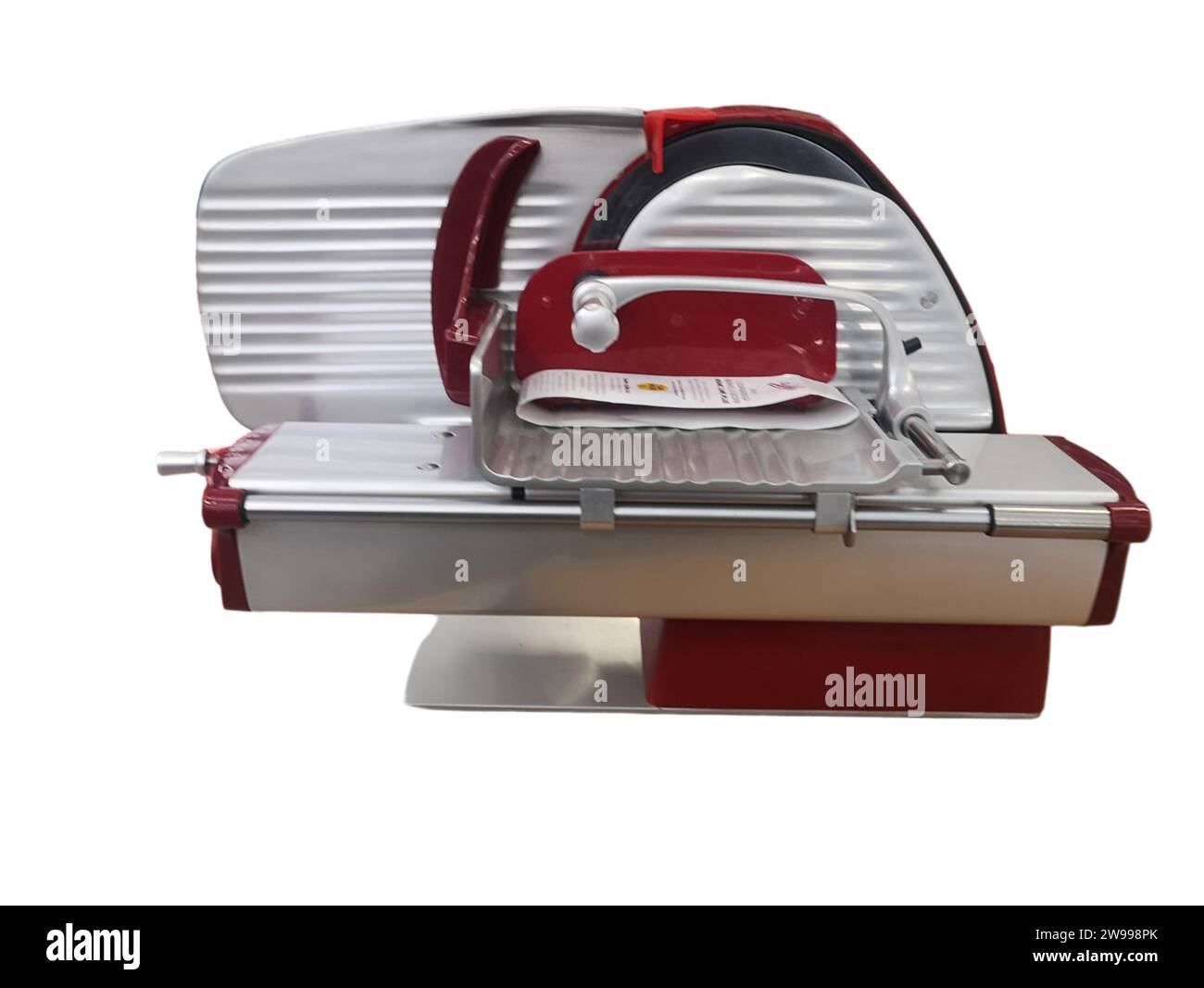 Ein Küchengerät aus Edelstahl steht auf einer weißen Arbeitsfläche Stockfoto