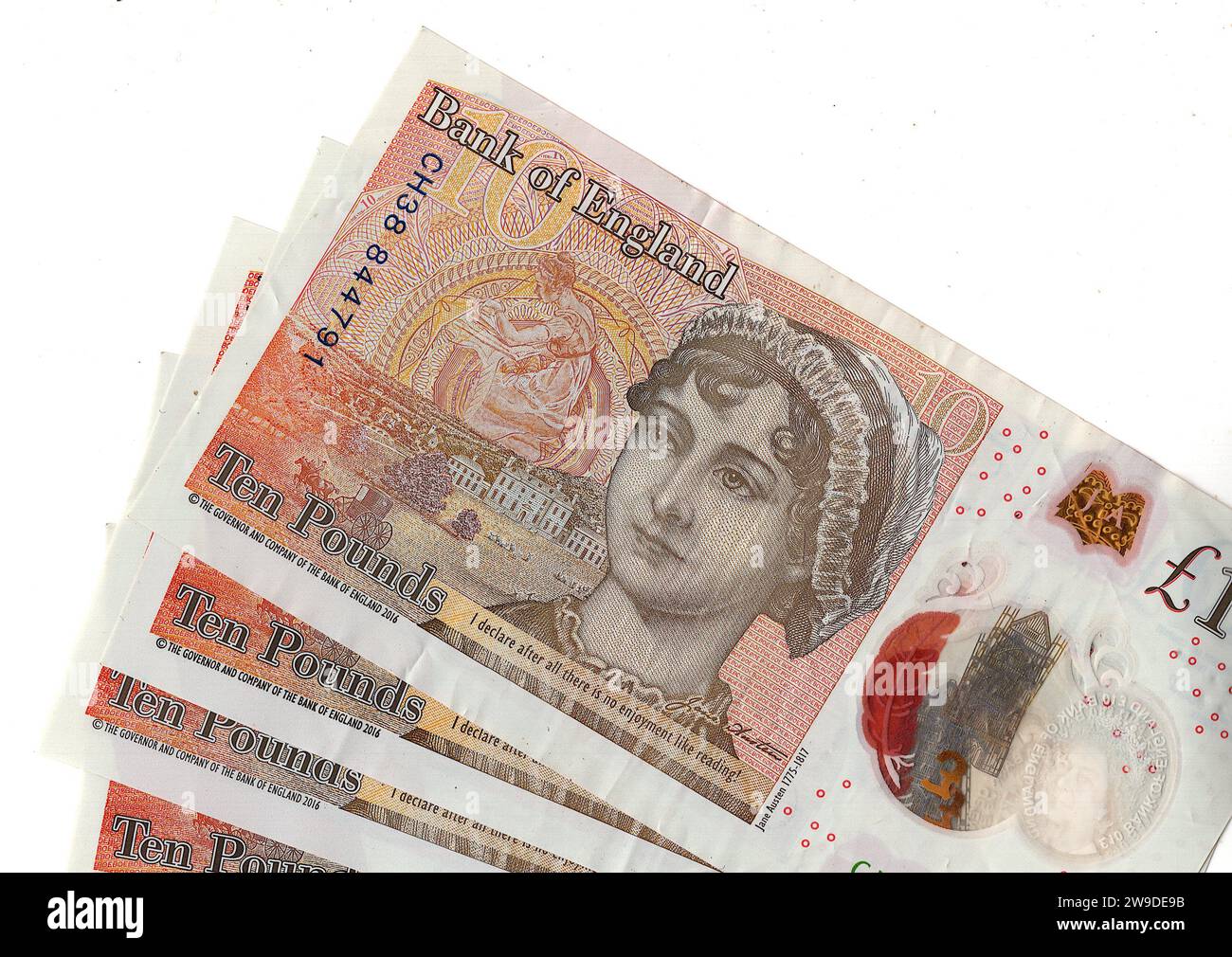 Zehn-Pfund-Notizen mit einem Porträt von Jane Austen aus Großbritannien/Großbritannien auf weißem Hintergrund. Stockfoto