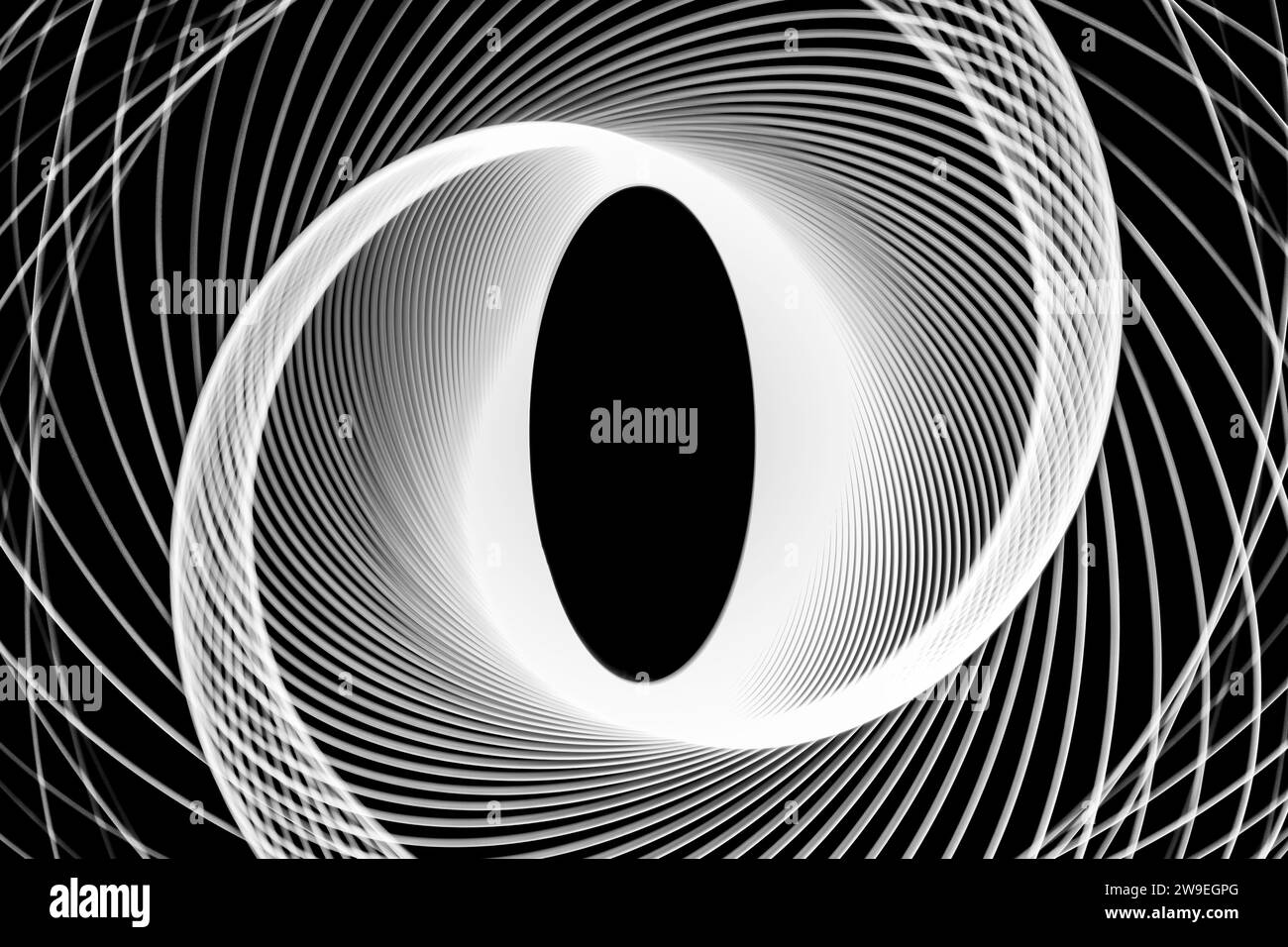 FOTO : Lichtmalerei von weißen Spirographen auf schwarzem Hintergrund Stockfoto