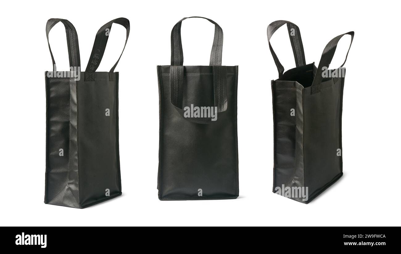 Set aus Einkaufstaschen aus schwarzem Canvas-Stoff, umweltfreundliche Alternative zu Kunststoff, stilvolle, robuste und wiederverwendbare Taschen für Lebensmittel und Einkäufe, Modell Stockfoto