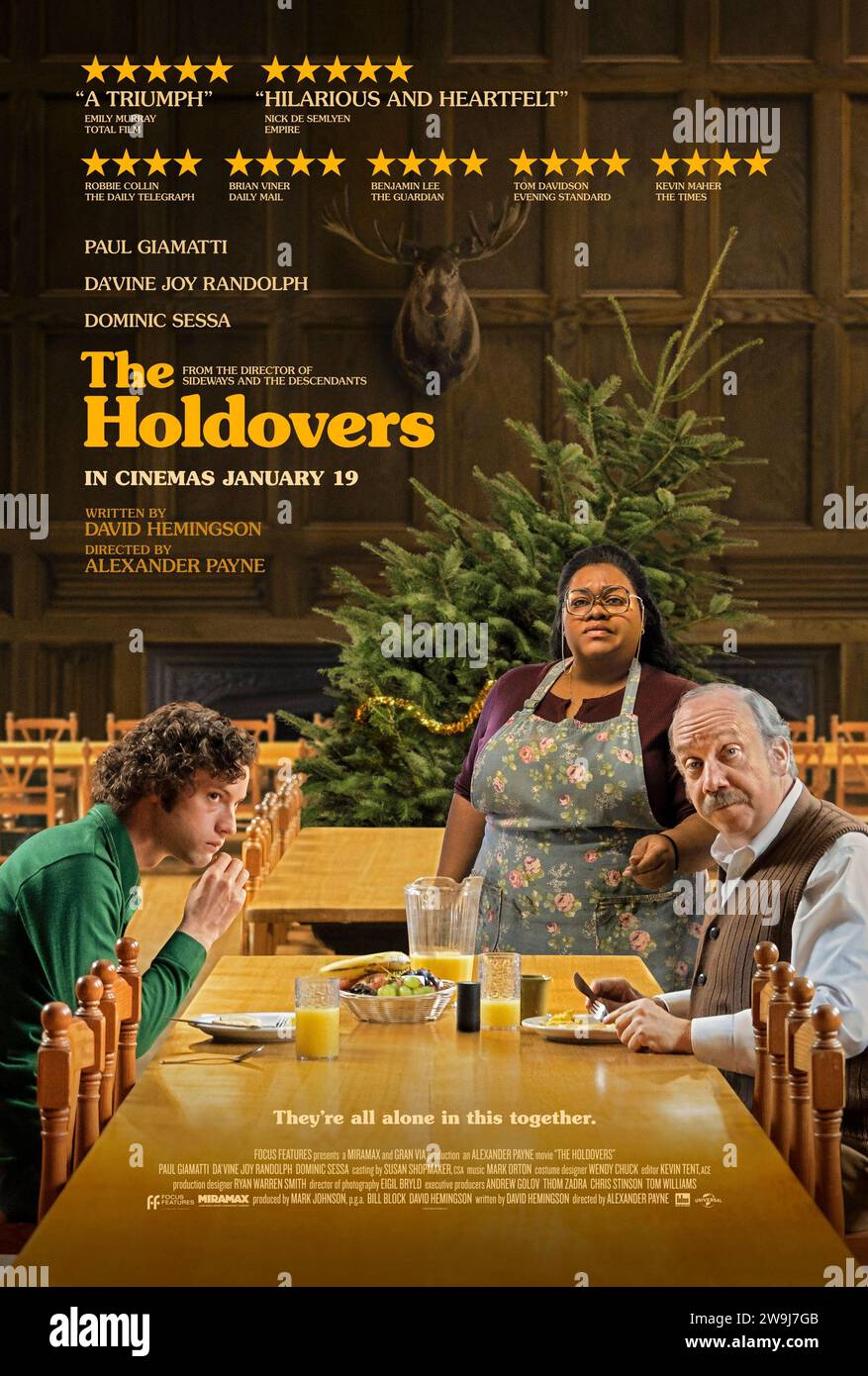 The Holdovers (2023) von Alexander Payne mit Paul Giamatti, da’Vine Joy Randolph und Dominic Sessa. Ein verrückter Geschichtslehrer an einer abgelegenen Vorschule ist gezwungen, über die Feiertage mit einem gestörten Schüler auf dem Campus zu bleiben, der keinen Platz hat. US-Poster mit einem Blatt ***NUR FÜR REDAKTIONELLE ZWECKE***. Quelle: BFA / Universal Pictures Stockfoto