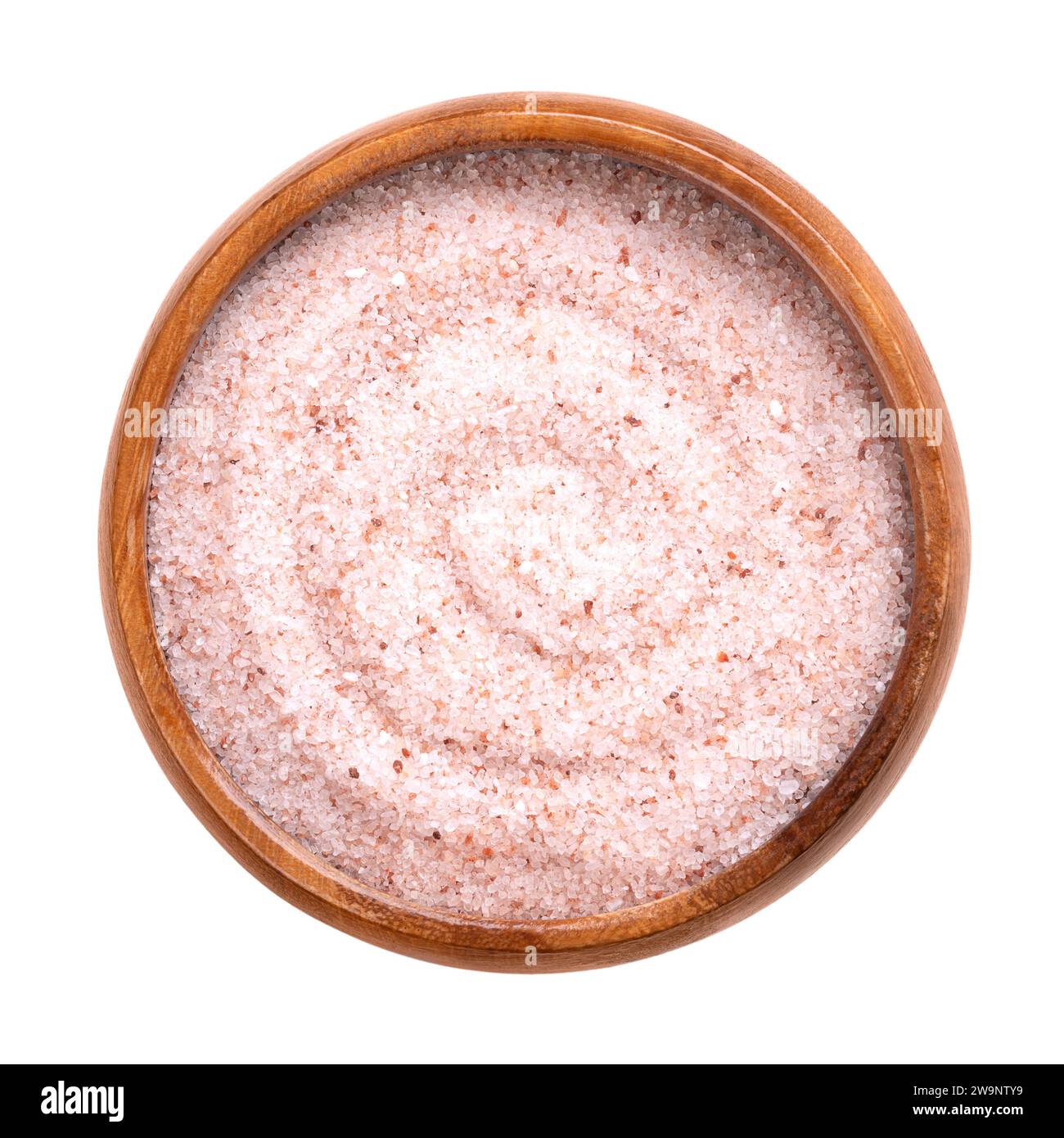 Himalaya rosa Salz fein, in einer Holzschale. Feines Himalaya-Salz, Steinsalz und Halit mit rosafarbener Färbung, durch Spuren von Mineralien. Stockfoto