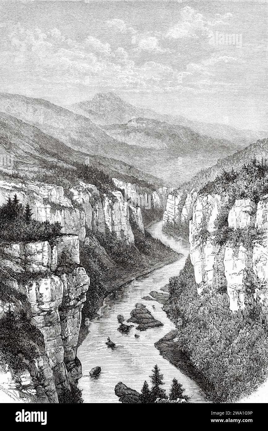 Der Fluss Doubs. Der Fluss Frankreich und die Schweiz, ein Nebenfluss der Saone, bilden die französisch-schweizerische Grenze. Bourgogne-Franche-Comté, Frankreich, Europa. Der Saut du Doubs, die französisch-schweizerische Grenze. Souvenir de Franche Comté Par Charles Joliet (1832 - 1910) Stich aus dem 19. Jahrhundert aus Le Tour du Monde 1880 Stockfoto