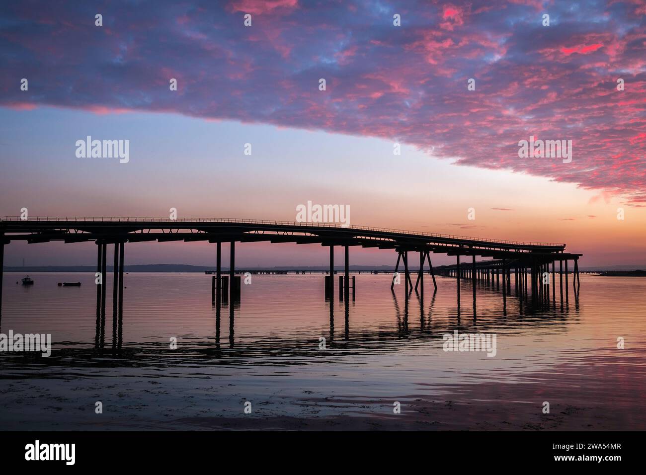 Der Sonnenuntergang Des Occidental Jetty Stockfoto