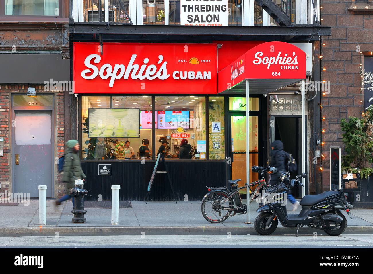 Sophie's Cuban Cuban Cuisine, 664 6th Ave, New York, New York, NYC Storefront Foto von einem schnellen zwanglosen Restaurant in Manhattans Viertel Chelsea. Stockfoto