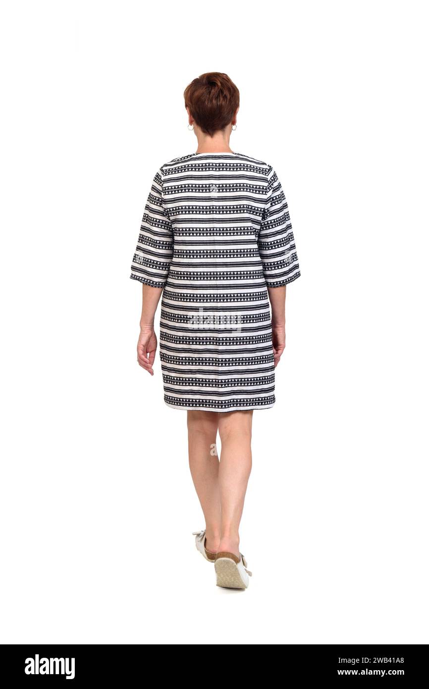 Rückansicht einer Frau, die auf weißem Hintergrund läuft Stockfoto