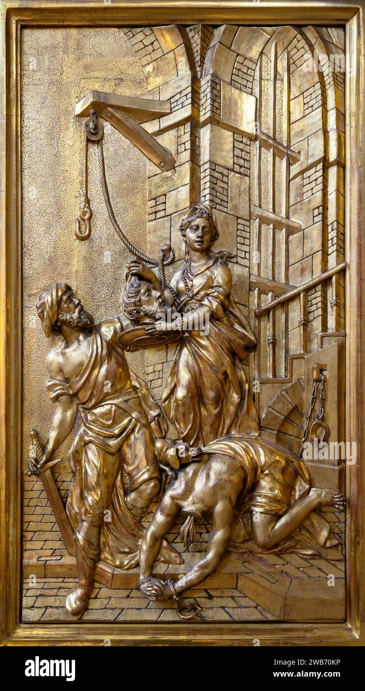 Die Enthauptung des heiligen Johannes des Täufers – eine Reliefskulptur. Kirche Saint Giles (Kirche St. Ägyd) in Gumpendorf, Wien. Stockfoto Die Enthauptung des heiligen Johannes des Täufers – eine Reliefskulptur. Kirche Saint Giles (Kirche St. Ägyd) in Gumpendorf, Wien. Stockfoto