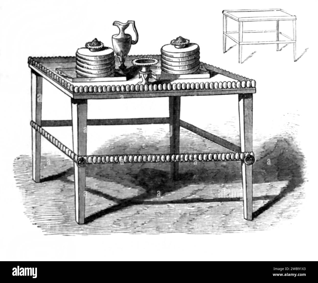 Holzgravur des Tafels des Schafbrotes (Exodus) aus der illustrierten Familienbibel – 12 Brote wurden auf dem Tisch platziert, die die 12 Stämme repräsentieren Stockfoto