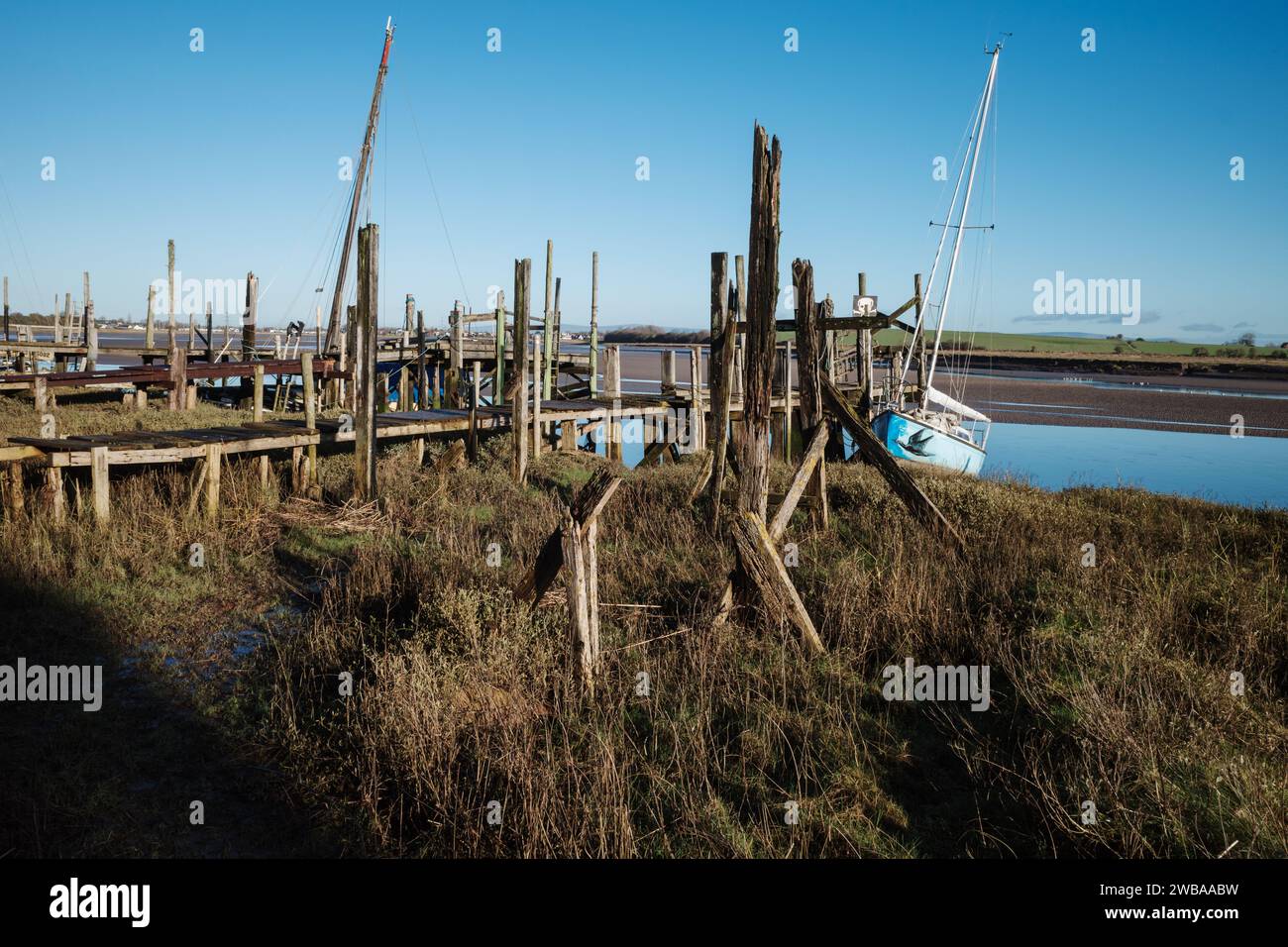 Skippool Creek Holzanker für Boote auf dem Fluss Wyre Lancashire UK Stockfoto